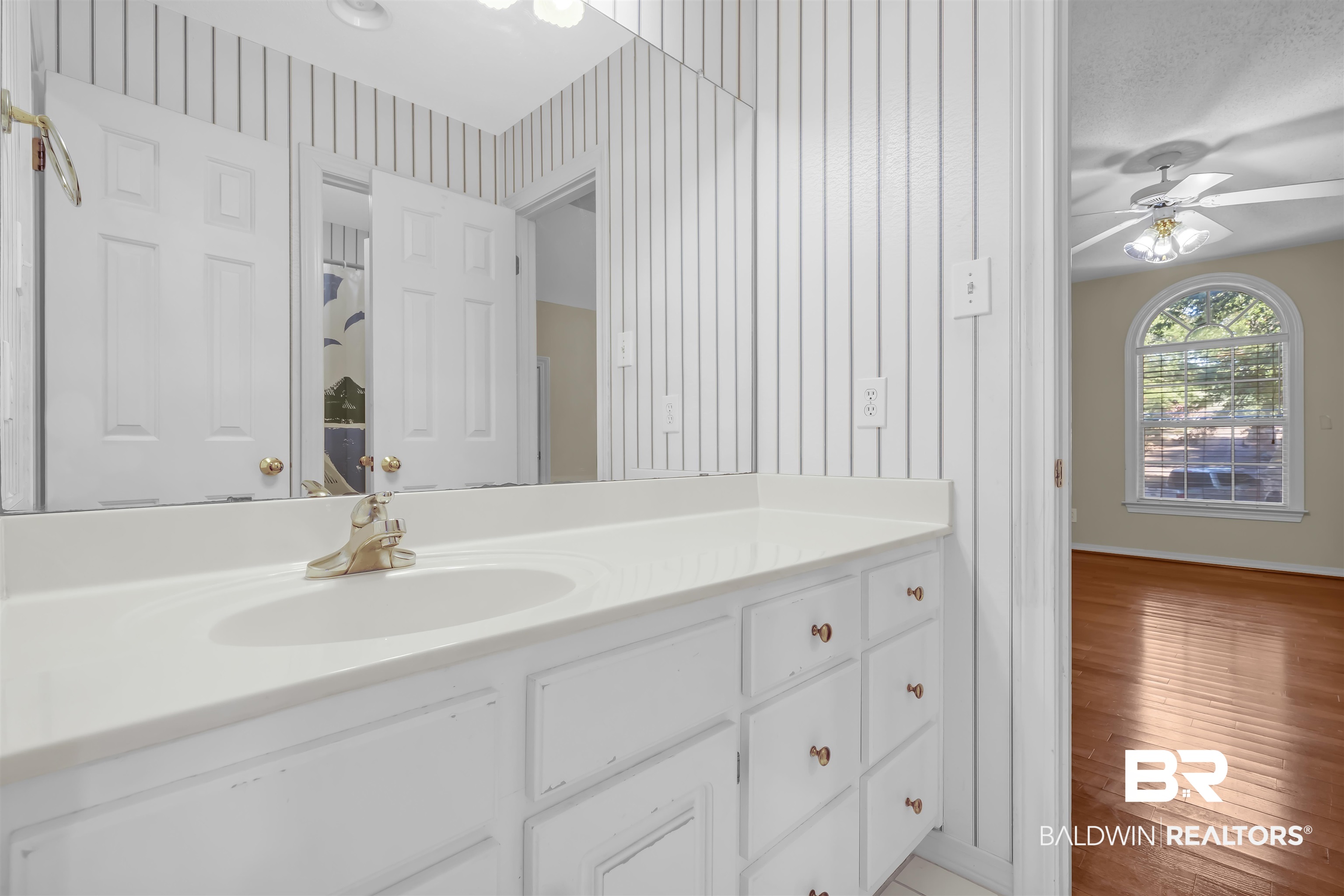 1262 Patrick Street Daphne, AL 36526 - Photo 27 of 35 Bathroom featuring vanity, a ceiling fan, and light wood-style flooring