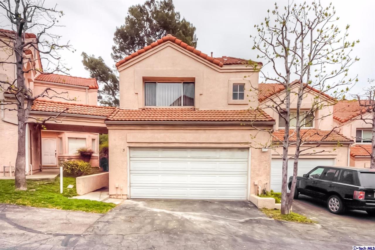 6255 Honolulu Avenue, Unit 5 Tujunga, CA 91042 - Photo 1 of 10 a view of a car park side of a road