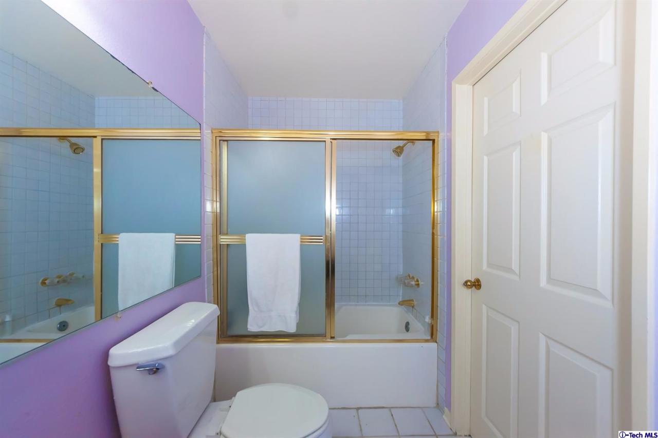 6255 Honolulu Avenue, Unit 5 Tujunga, CA 91042 - Photo 6 of 10 a bathroom with a toilet and a shower