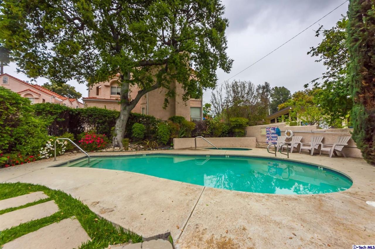 6255 Honolulu Avenue, Unit 5 Tujunga, CA 91042 - Photo 10 of 10 a view of a garden with swimming pool