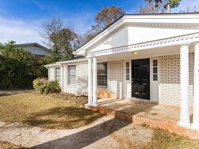 a view of a house with a patio