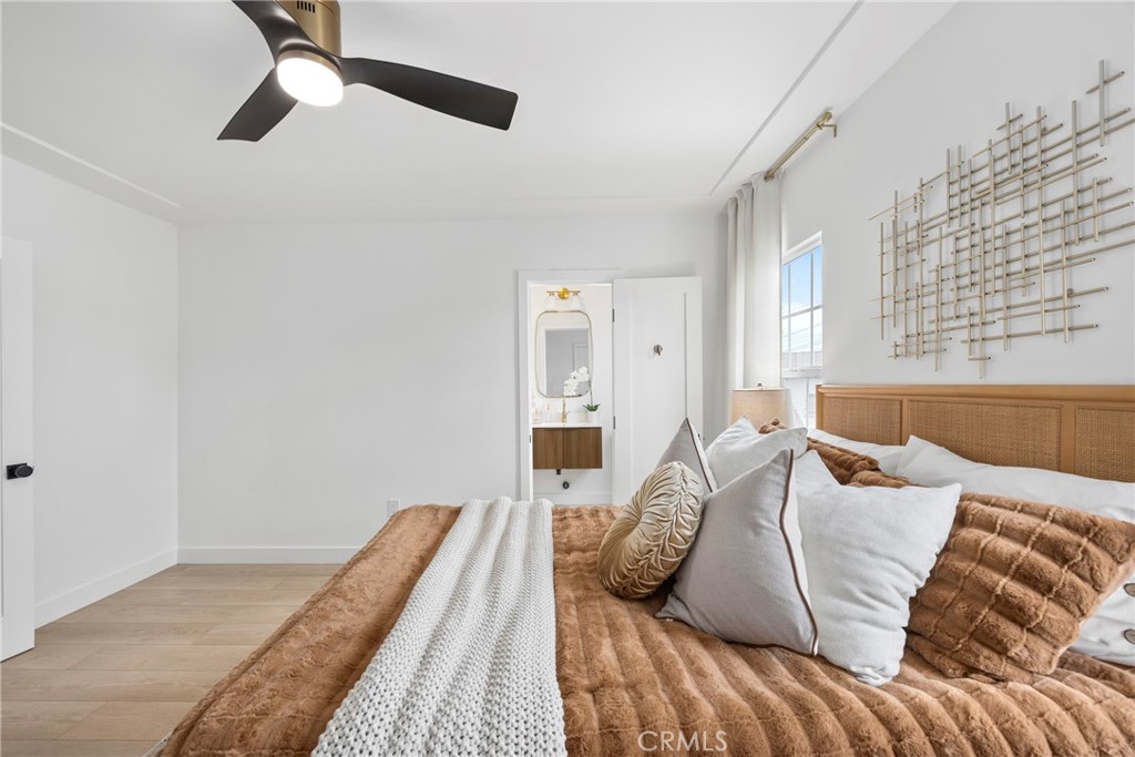 4254 West 58th Place Los Angeles, CA 90043 - Photo 23 of 53 a bedroom with a bed and a window