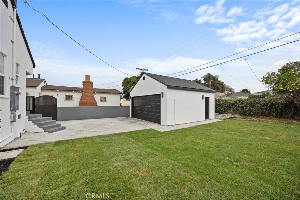 4254 West 58th Place Los Angeles, CA 90043 - Photo 34 of 53 a house view with a backyard space