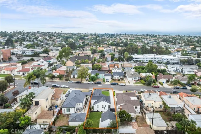 an aerial view of residential house with outdoor space