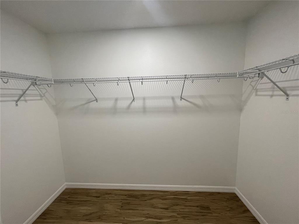 8829 East Marvin Street Floral City, FL 34436 - Photo 11 of 12 a view of a room with racks on the wall