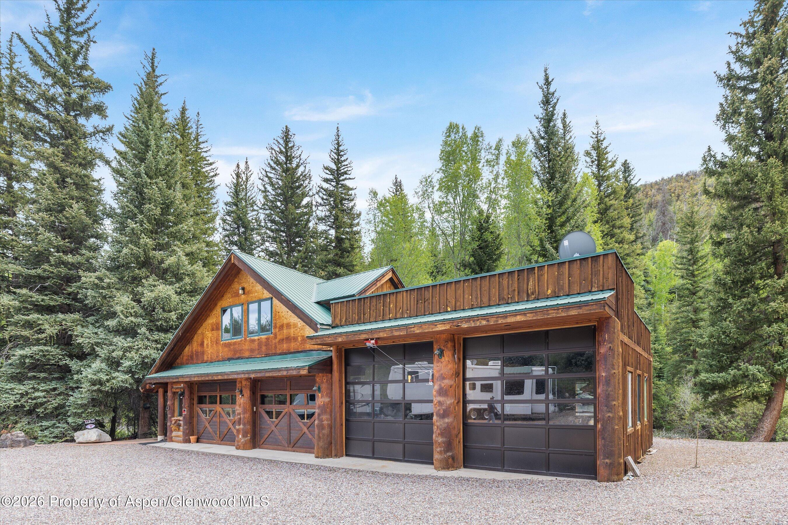 5980 Snowmass Creek Road Snowmass, CO 81654 - Photo 6 of 22 Workshop with Grandfathered ADU