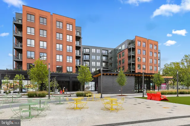 a view of building with small garden