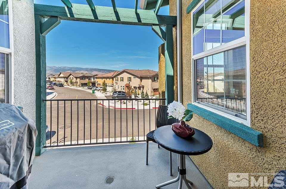 1920 Dark Horse Road, Unit A103 Reno, NV 89521 - Photo 12 of 15 a view of a balcony and chairs