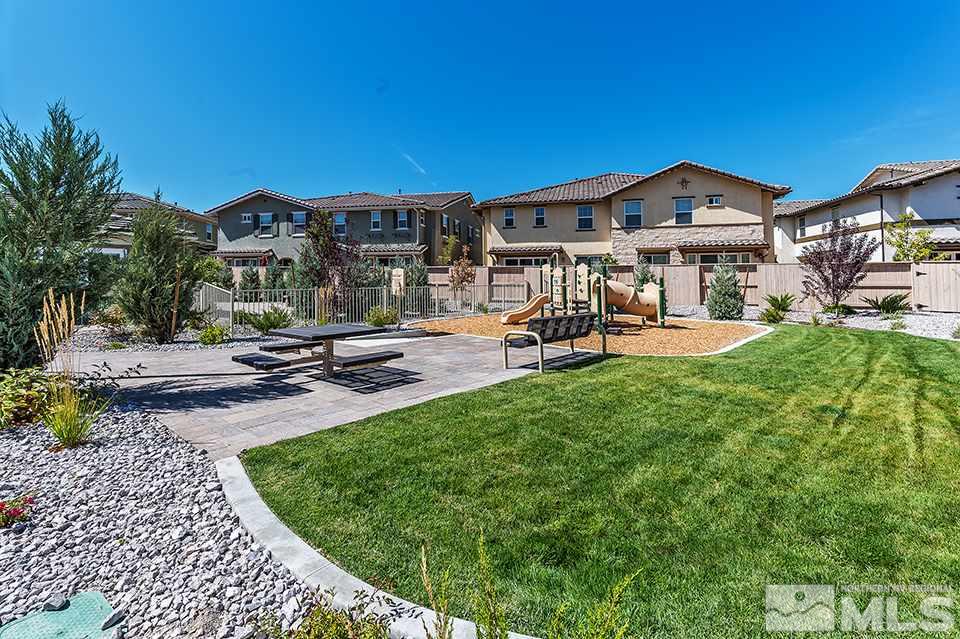 1920 Dark Horse Road, Unit A103 Reno, NV 89521 - Photo 2 of 15 a view of a house with garden and sitting area