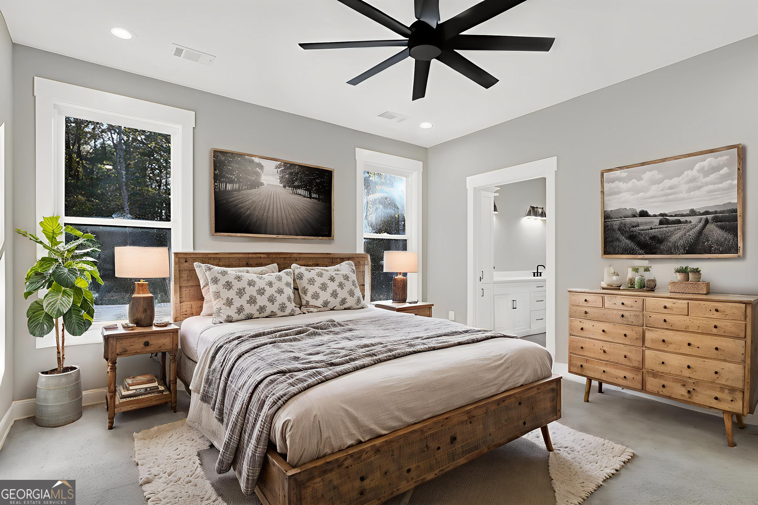 507 North Ridge Road Barnesville, GA 30204 - Photo 13 of 22 a bedroom with a bed and a flat screen television