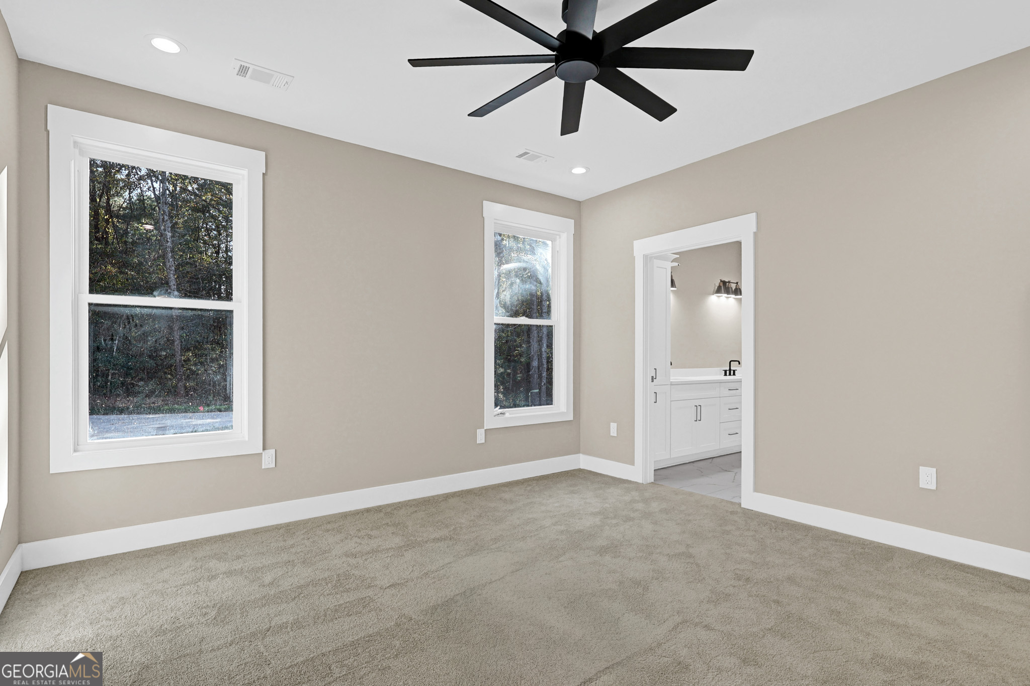 507 North Ridge Road Barnesville, GA 30204 - Photo 14 of 22 an empty room with windows and fan