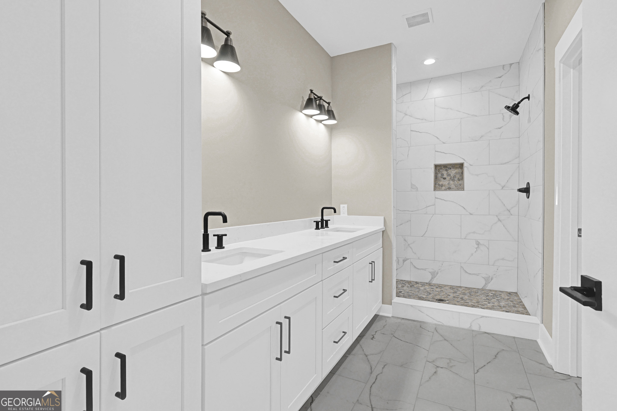 507 North Ridge Road Barnesville, GA 30204 - Photo 15 of 22 a spacious bathroom with double sink and a shower