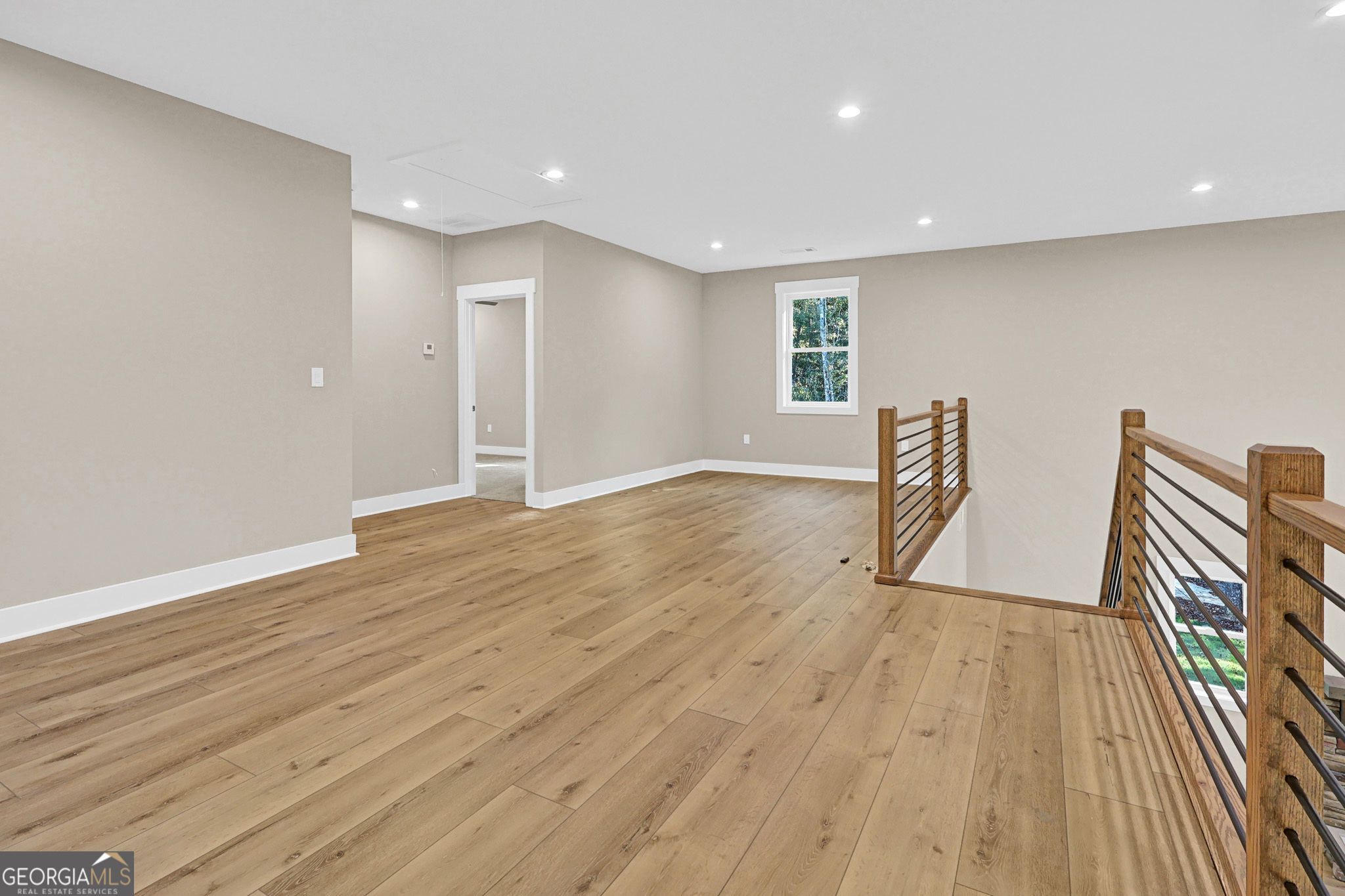 507 North Ridge Road Barnesville, GA 30204 - Photo 16 of 22 a view of empty room with wooden floor
