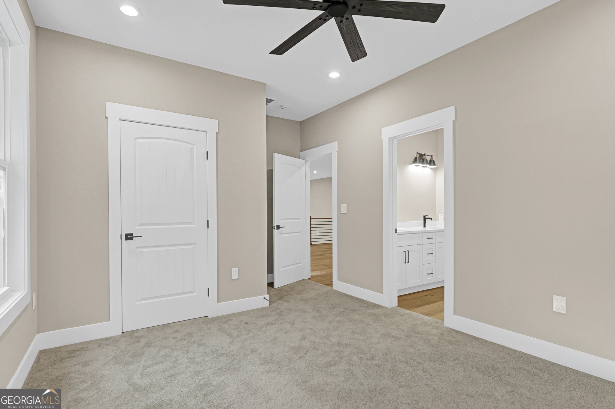 507 North Ridge Road Barnesville, GA 30204 - Photo 21 of 22 an empty room with fan and entrance