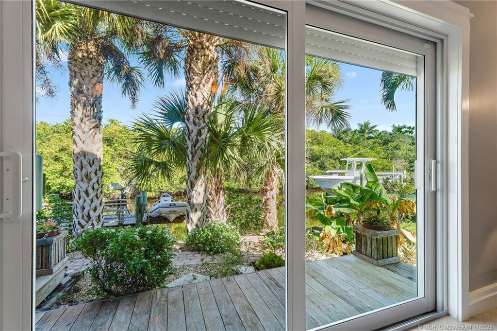655 Southwest Salerno Road Stuart, FL 34997 - Photo 37 of 84 a view of a garden from a window