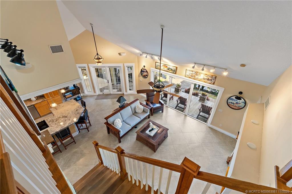 655 Southwest Salerno Road Stuart, FL 34997 - Photo 42 of 84 a view of a living room with furniture and a wooden floor
