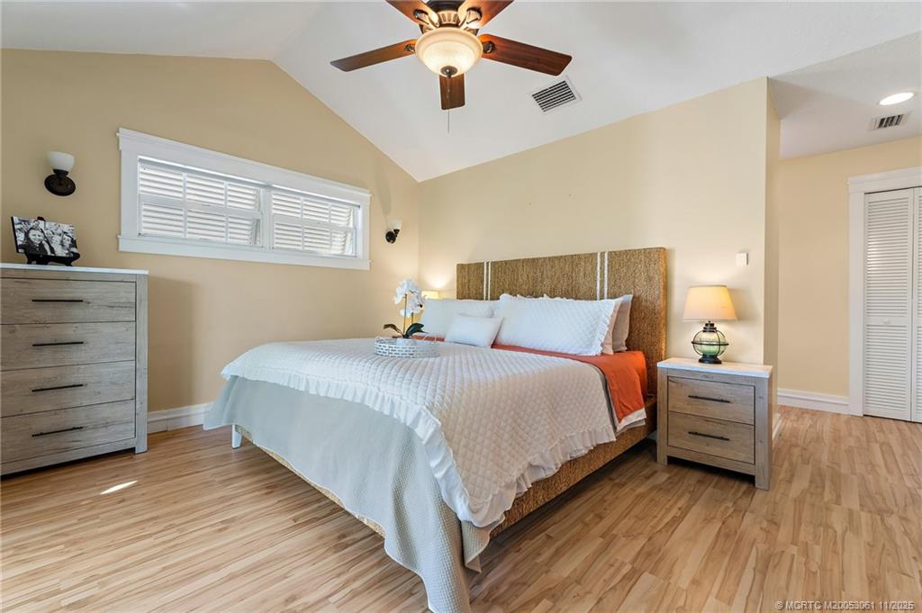 655 Southwest Salerno Road Stuart, FL 34997 - Photo 45 of 84 a bedroom with a bed and window