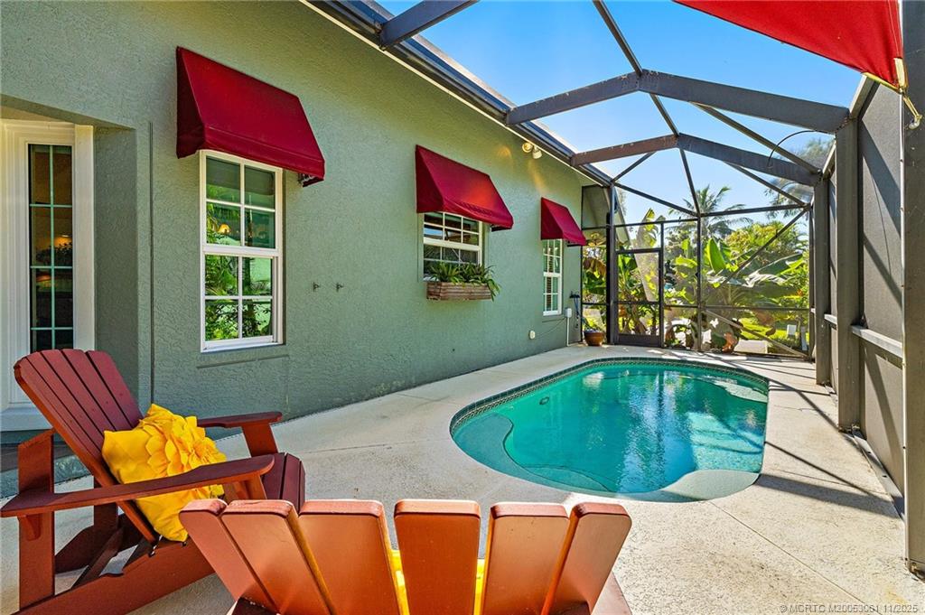 655 Southwest Salerno Road Stuart, FL 34997 - Photo 66 of 84 a view of a chairs and table in the patio