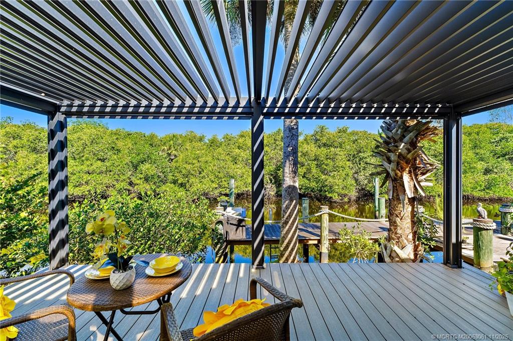 655 Southwest Salerno Road Stuart, FL 34997 - Photo 74 of 84 a view of swimming pool from a balcony