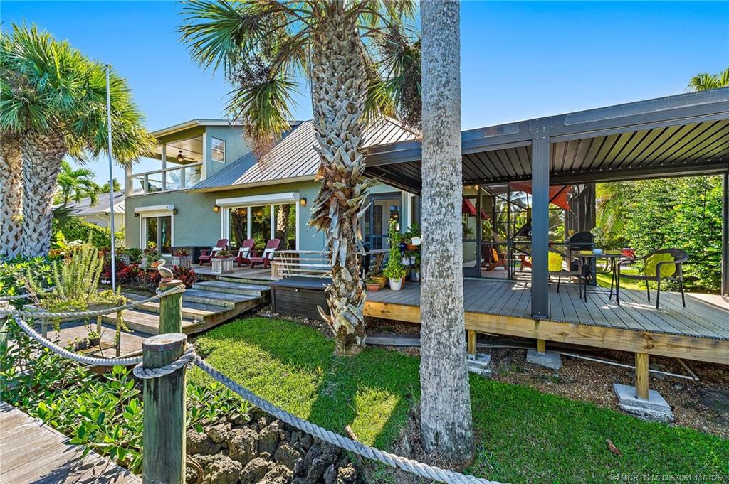 655 Southwest Salerno Road Stuart, FL 34997 - Photo 84 of 84 a view of outdoor space yard deck and patio