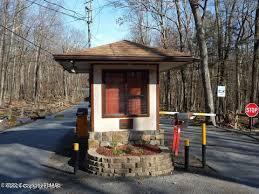 226 Bluebird Drive Bushkill, PA 18324 - Photo 4 of 6 a front view of a house with garden