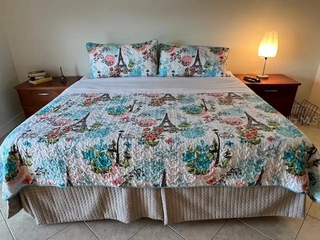 a bed with a bed and a couch