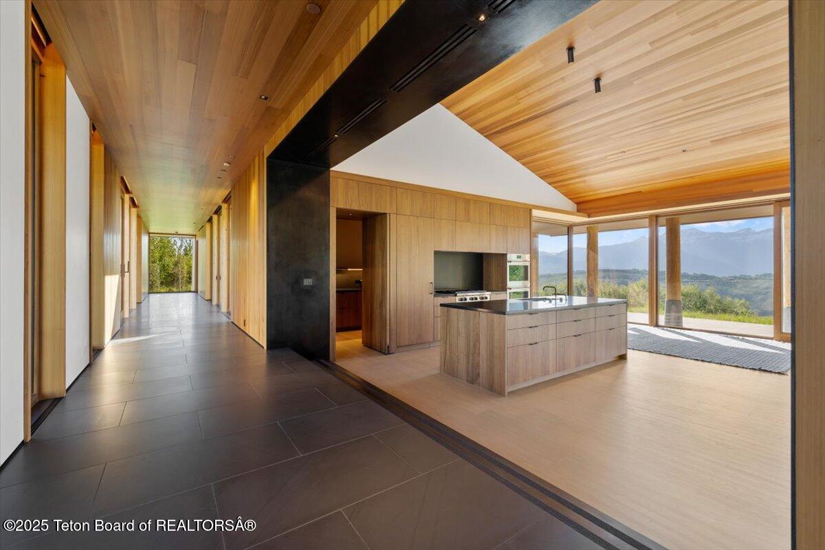 585 Sena Road Jackson, WY 83001 - Photo 32 of 55 Hallway to Kitchen