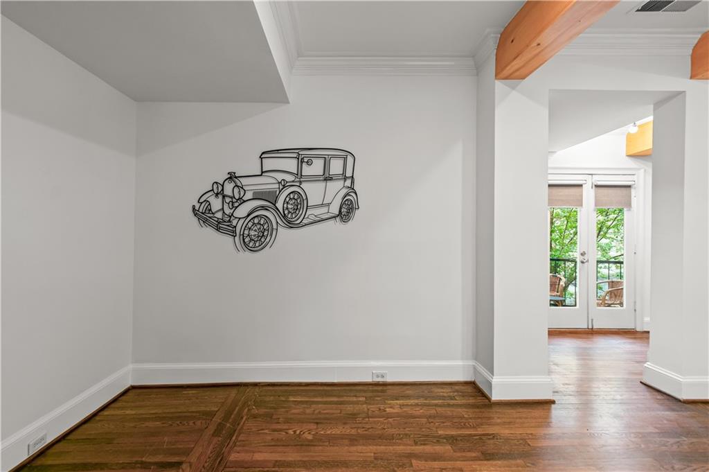 2840 Peachtree Road Northwest, Unit 312 Atlanta, GA 30305 - Photo 21 of 42 a view of a room with wooden floor