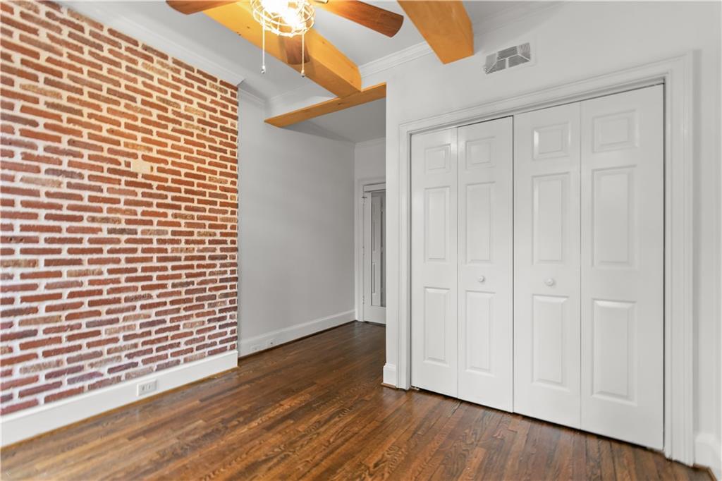 2840 Peachtree Road Northwest, Unit 312 Atlanta, GA 30305 - Photo 26 of 42 a view of a livingroom with wooden floor
