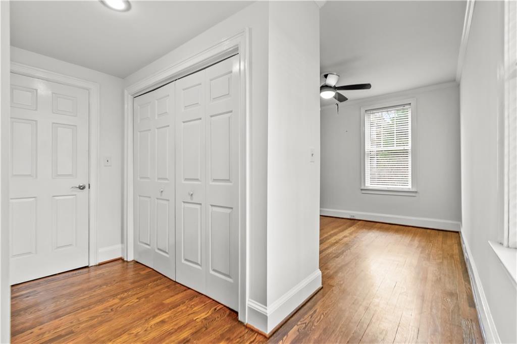 2840 Peachtree Road Northwest, Unit 312 Atlanta, GA 30305 - Photo 32 of 42 wooden floor in an empty room with a window