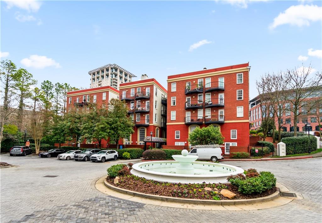 2840 Peachtree Road Northwest, Unit 312 Atlanta, GA 30305 - Photo 41 of 42 a front view of a building with street view