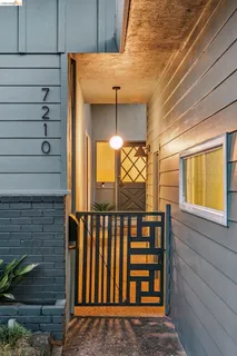 a dining room with a table and chairs