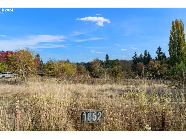 a view of lake with green space