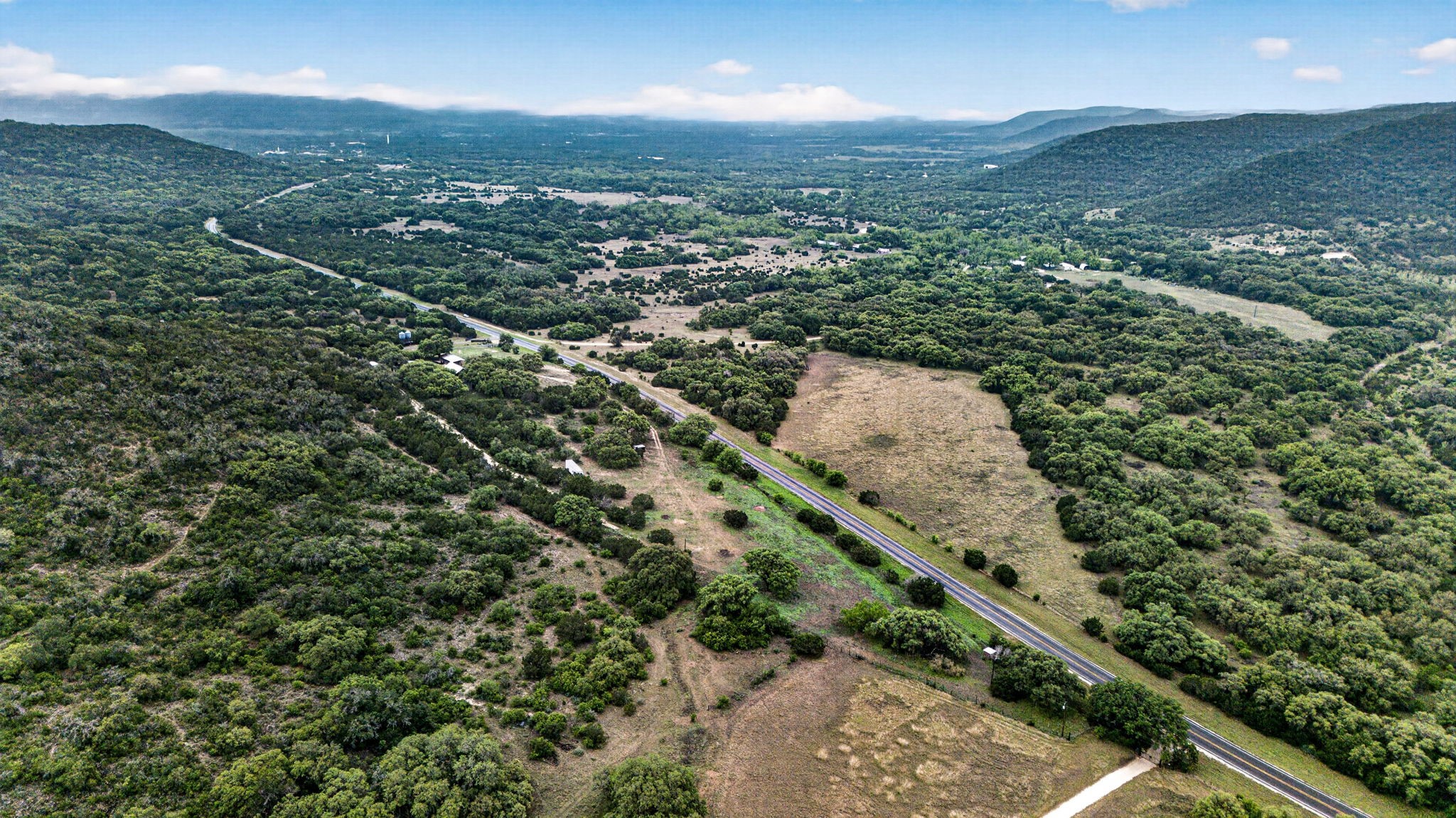 1850 Ranch Road 337 Leakey, TX 78873 - Photo 8 of 50 Aerial view showcasing usable acreage, natural landscape, and peaceful Hill Country setting