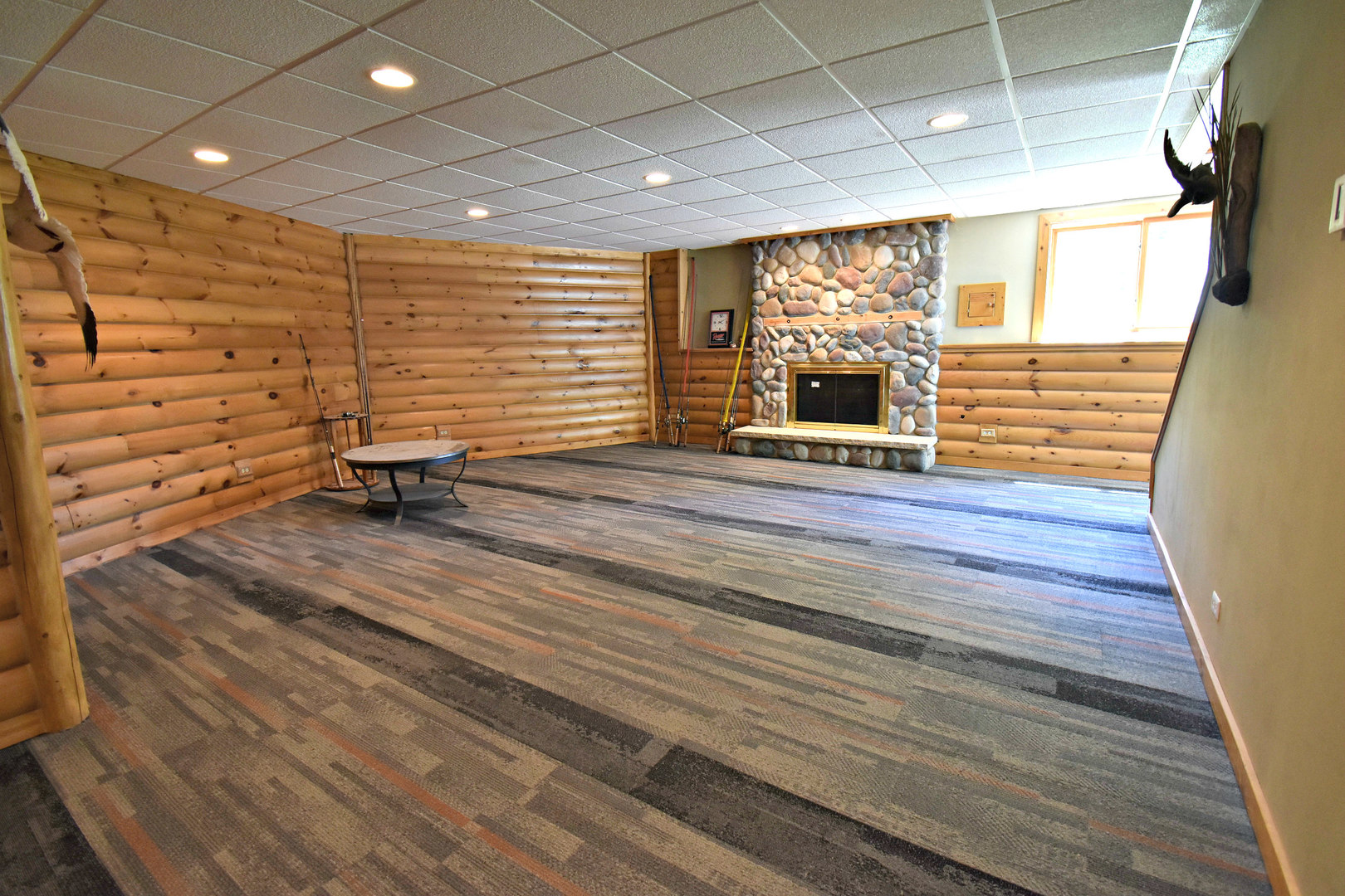 8101 Greenwood Road Hebron, IL 60034 - Photo 22 of 39 a view of an empty room with wooden floor and a window