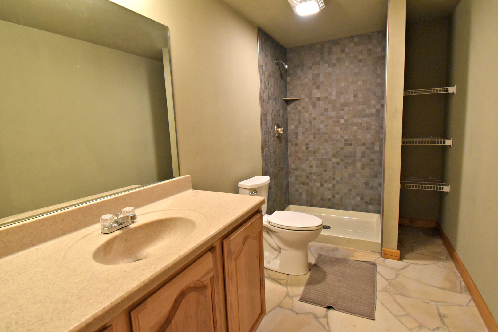 8101 Greenwood Road Hebron, IL 60034 - Photo 25 of 39 a bathroom with a sink toilet and shower