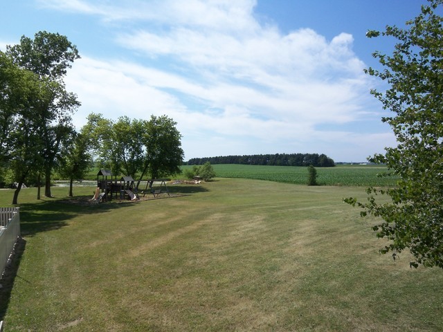 8101 Greenwood Road Hebron, IL 60034 - Photo 36 of 39 a view of a field with an trees