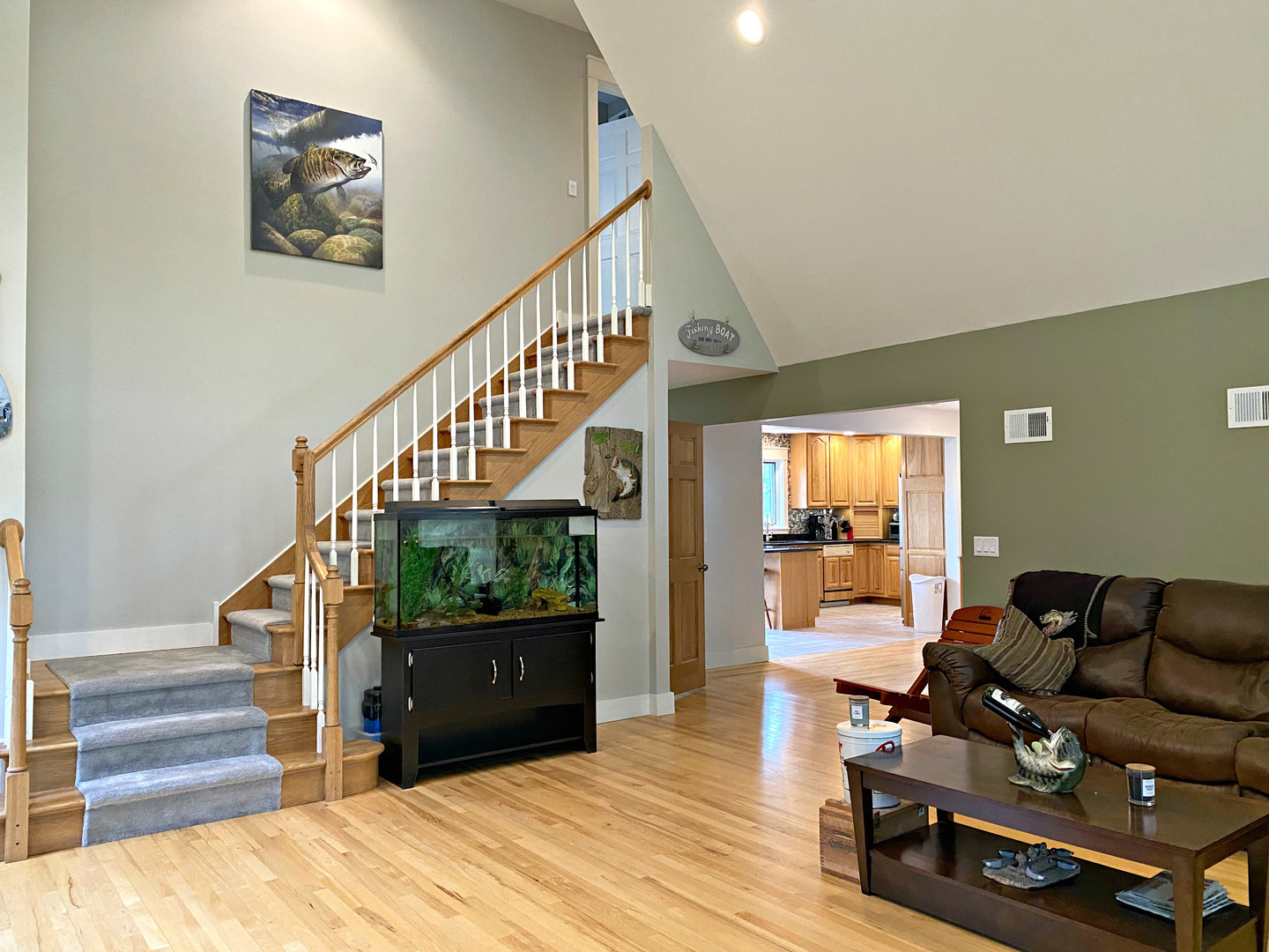 8101 Greenwood Road Hebron, IL 60034 - Photo 10 of 39 a living room with furniture and a stair