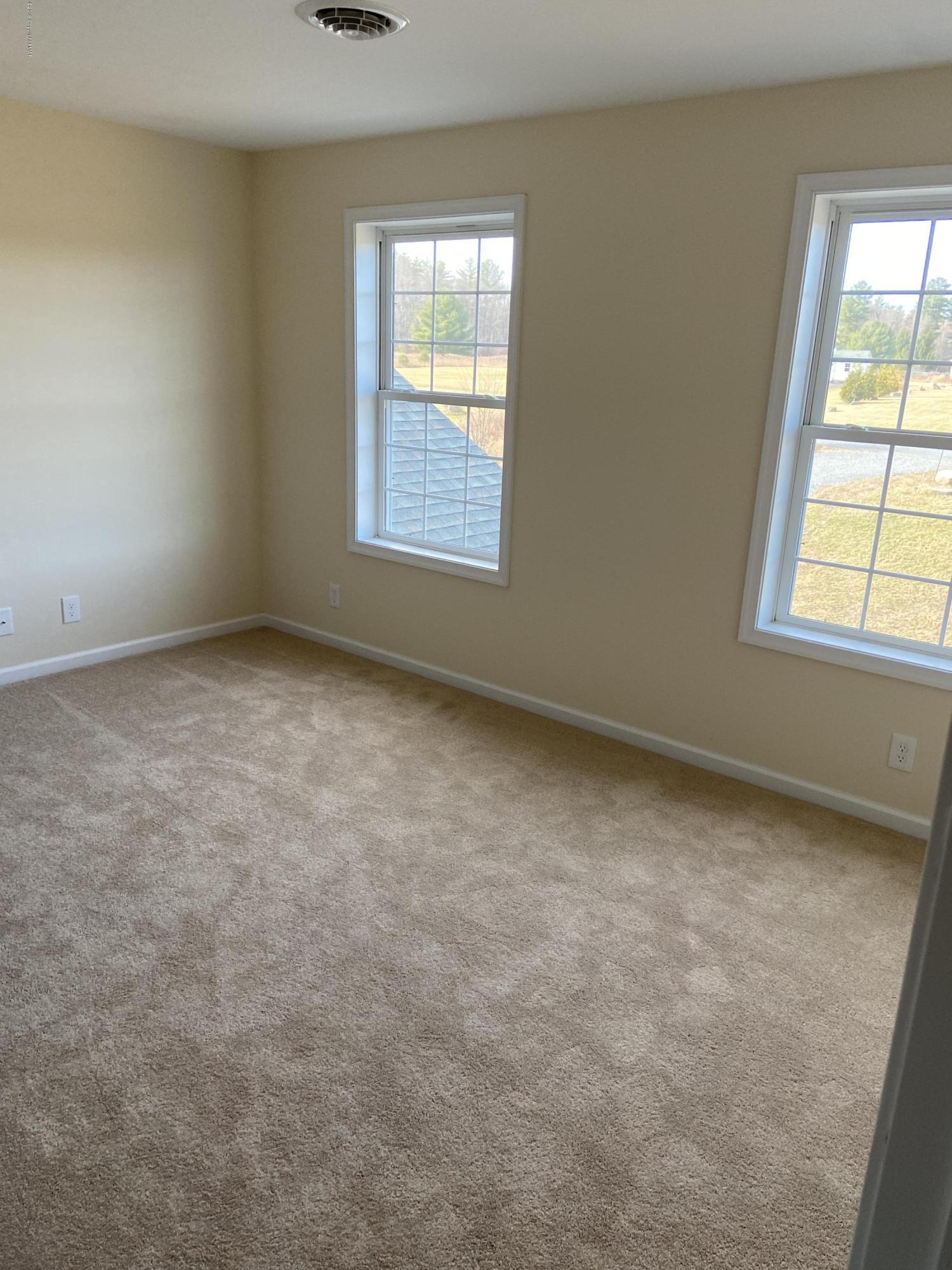 330 Chestnut Road Blakeslee, PA 18610 - Photo 19 of 29 an empty room with a window
