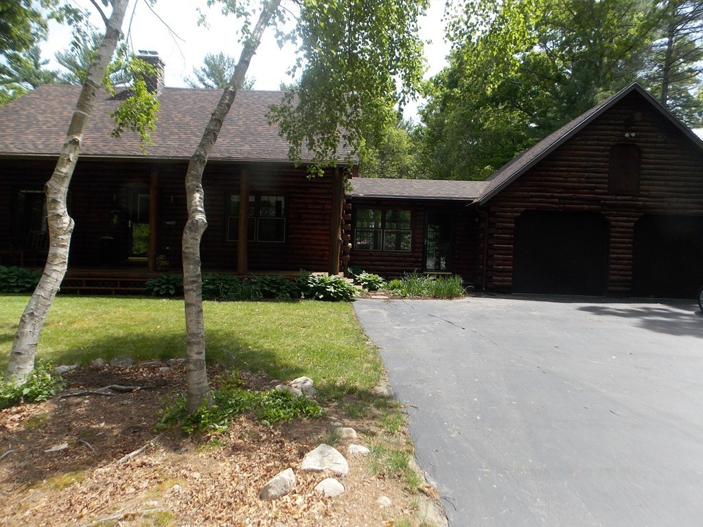 7 Betty Spring Road Freetown, MA 02717 - Photo 29 of 30 a front view of a house with a yard