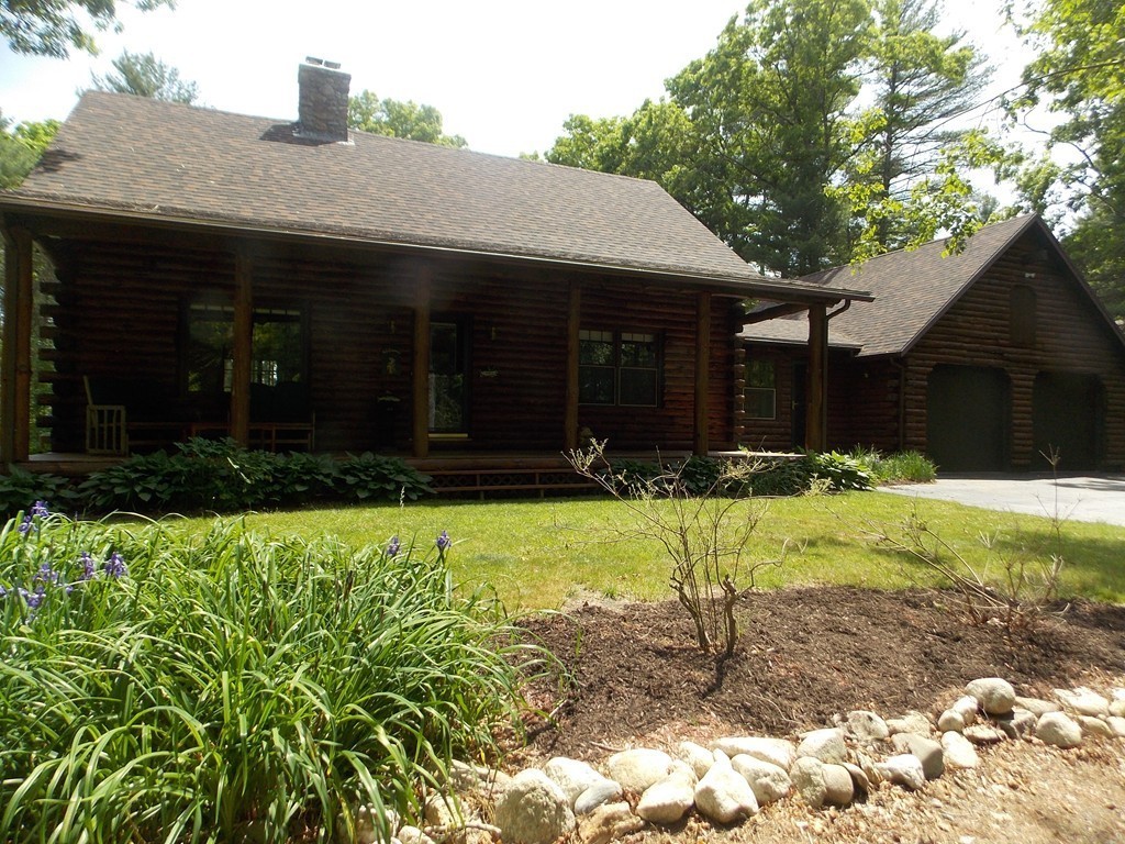 7 Betty Spring Road Freetown, MA 02717 - Photo 30 of 30 a front view of a house with garden