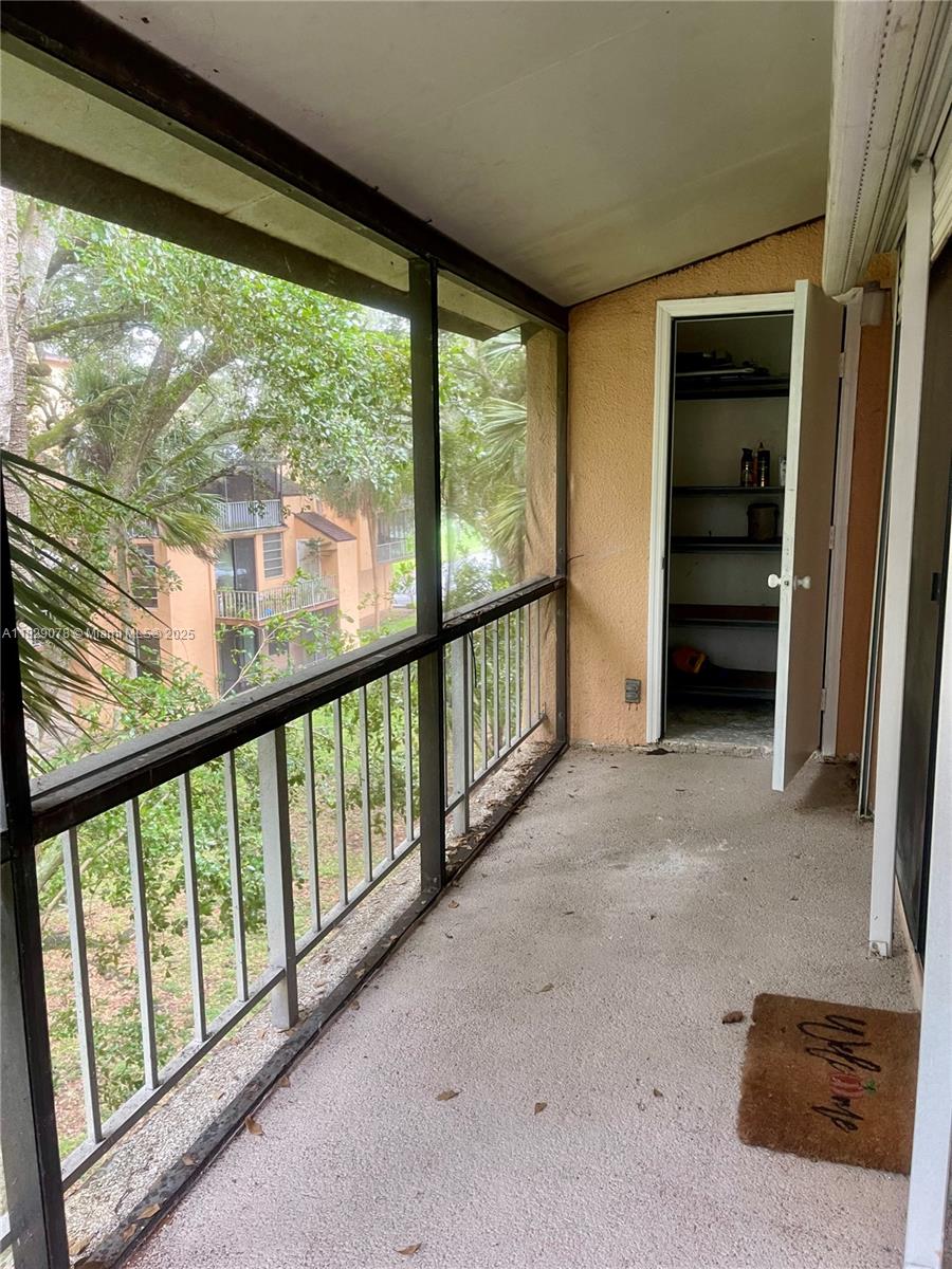 430 Commodore Drive, Unit 301 Plantation, FL 33325 - Photo 24 of 26 a view of hallway with stairs and furniture