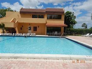 430 Commodore Drive, Unit 301 Plantation, FL 33325 - Photo 26 of 26 a view of house with yard