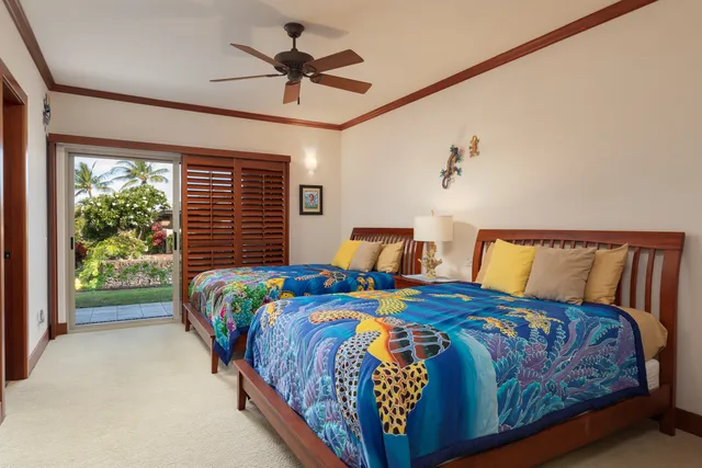 a bedroom with bed and balcony