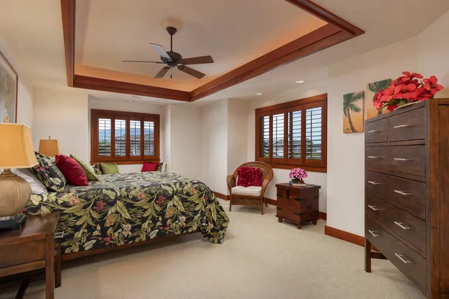 a bed room with a bed and a window