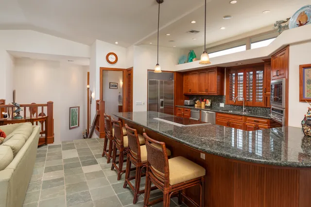 a very nice looking kitchen with a large window