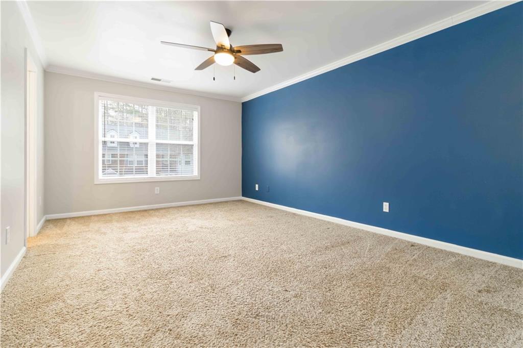 3864 Guilderoy Lane, Unit 3 Austell, GA 30106 - Photo 18 of 27 an empty room with a window
