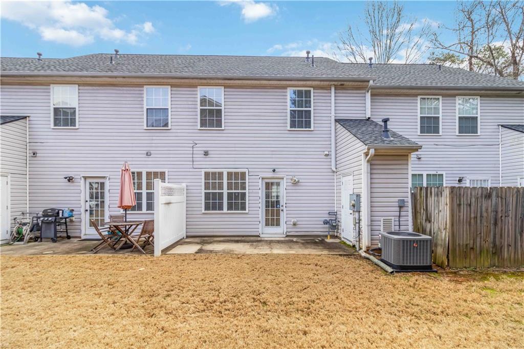 3864 Guilderoy Lane, Unit 3 Austell, GA 30106 - Photo 24 of 27 a view of a house with snow on the road