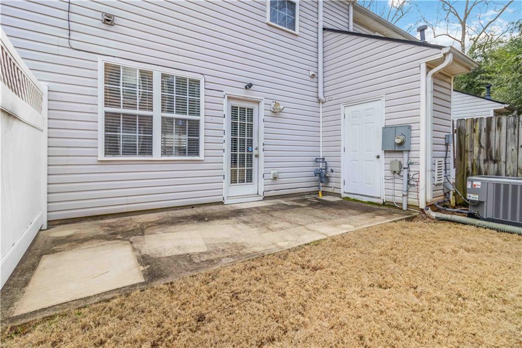 3864 Guilderoy Lane, Unit 3 Austell, GA 30106 - Photo 26 of 27 a view of a house with a patio