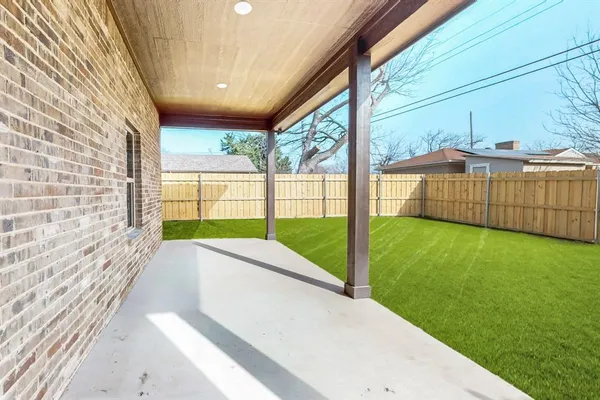 a view of a garden with an outdoor space